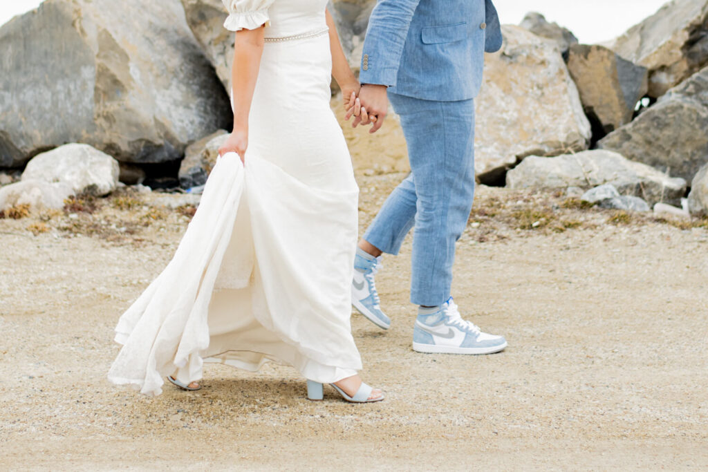 Close up of bride and groom's shoes while they are walking