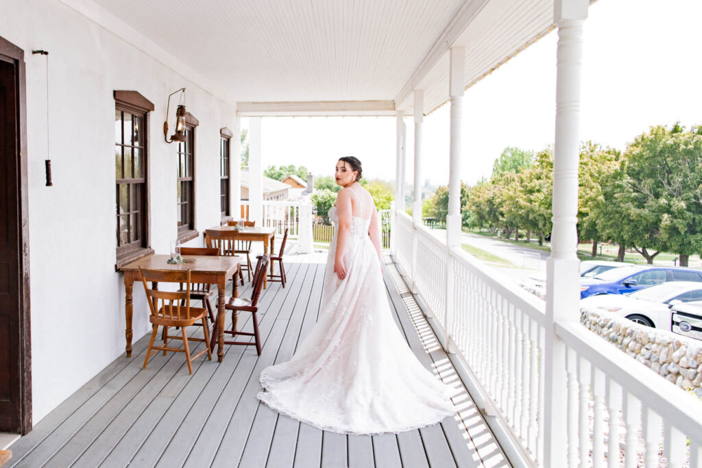 Bride walking away along a big porch