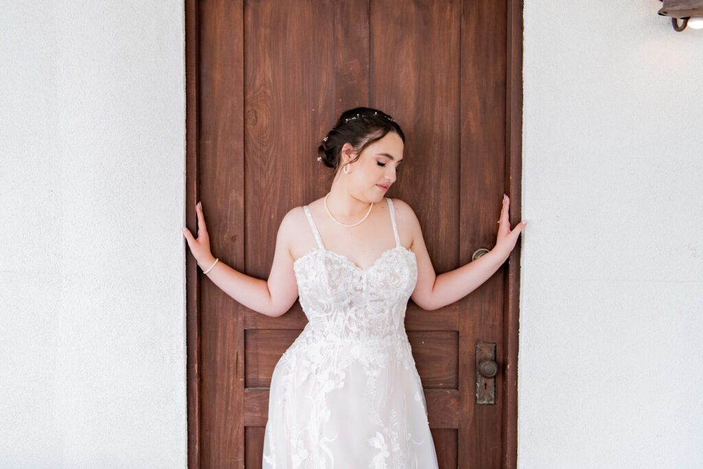 Bride standing in a doorway