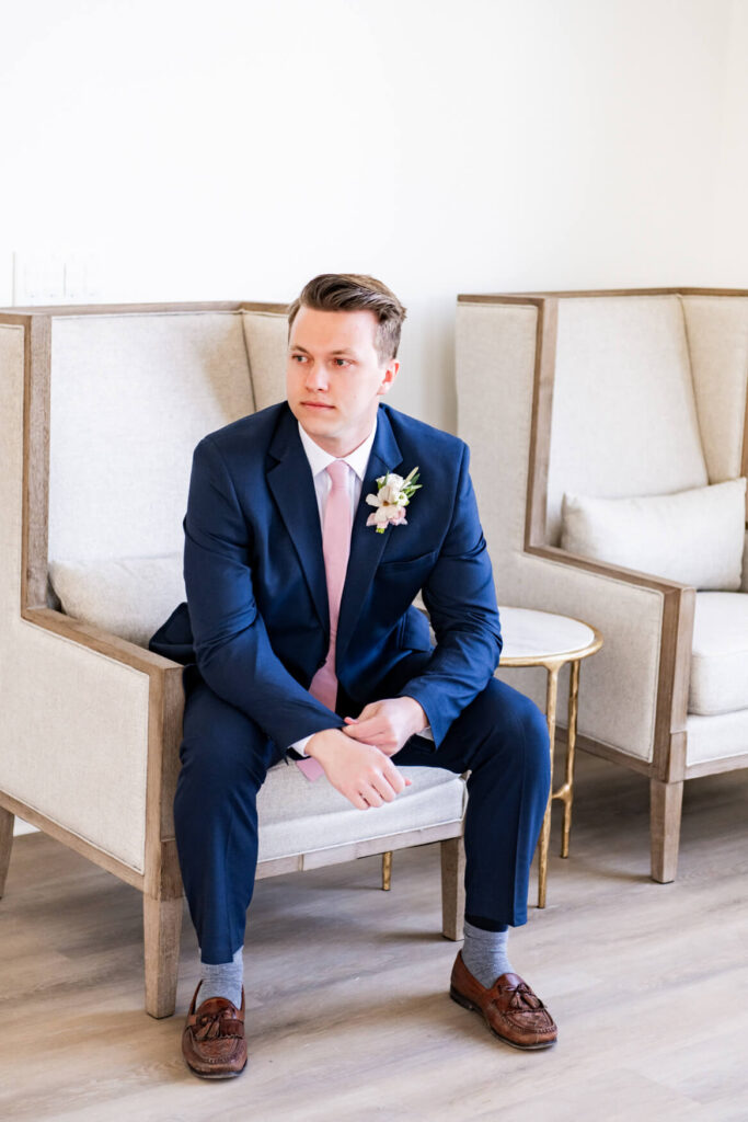 Groom sitting on a chair